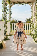 Bow Print Baby Dress with Matching Hat – Cream & Navy